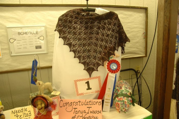 Winning shawl, very dark brown and red knitted with handspun
