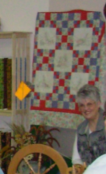 Quilt, spinning wheel, spinner